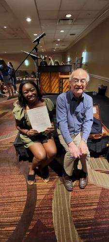 Callaway HS choral director Samantha Cotton with Maestro John Rutter prior to the first rehearsal....he kindly autographed her music which is what she's holding.